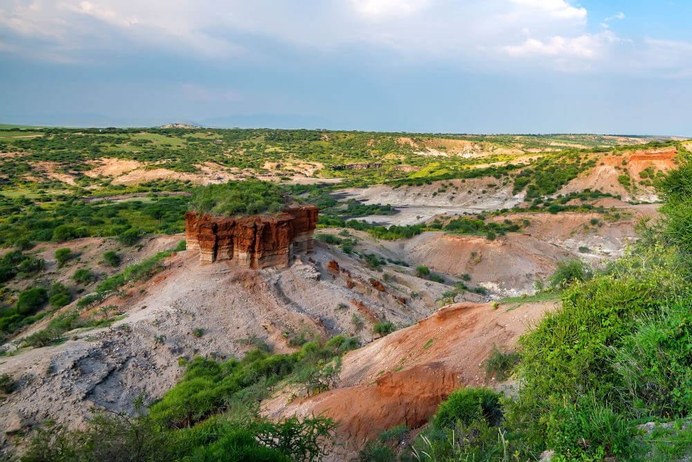 Panoramic view of Olduvai Gorge archaeological site with its distinctive layered rock formations